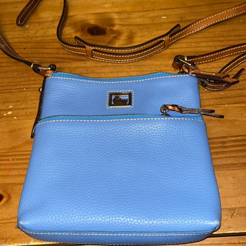 9 inch by 8 inch blue Dooney and Bourke